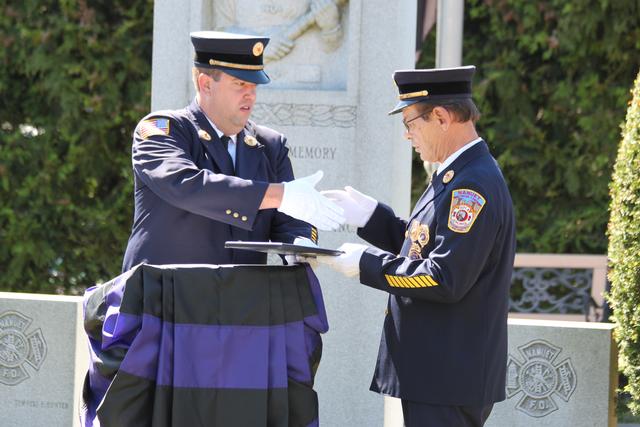 Years of service award given to Socky Trojahn. 50 years.

Memorial Service NFD. September 9, 2012. Photo by Vincent P. Tuzzolino